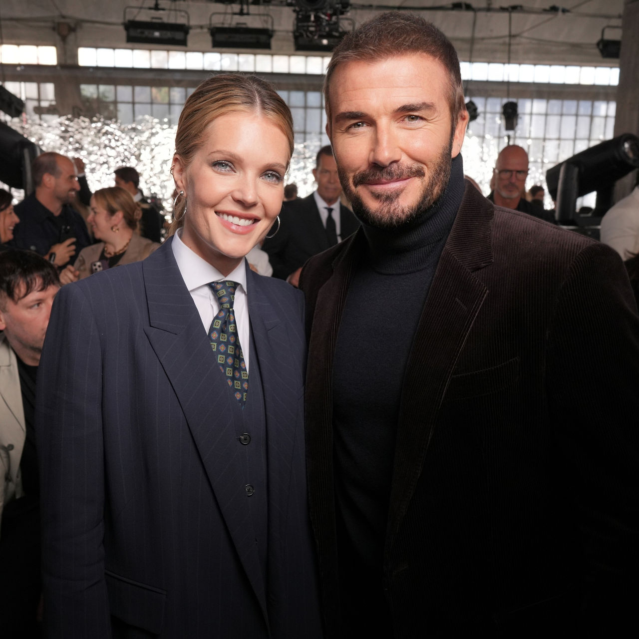 BOSS_Spring_Summer_26_Fashion_Show_Arrivals_Meghann_Fahy_and_David_Beckham.jpg