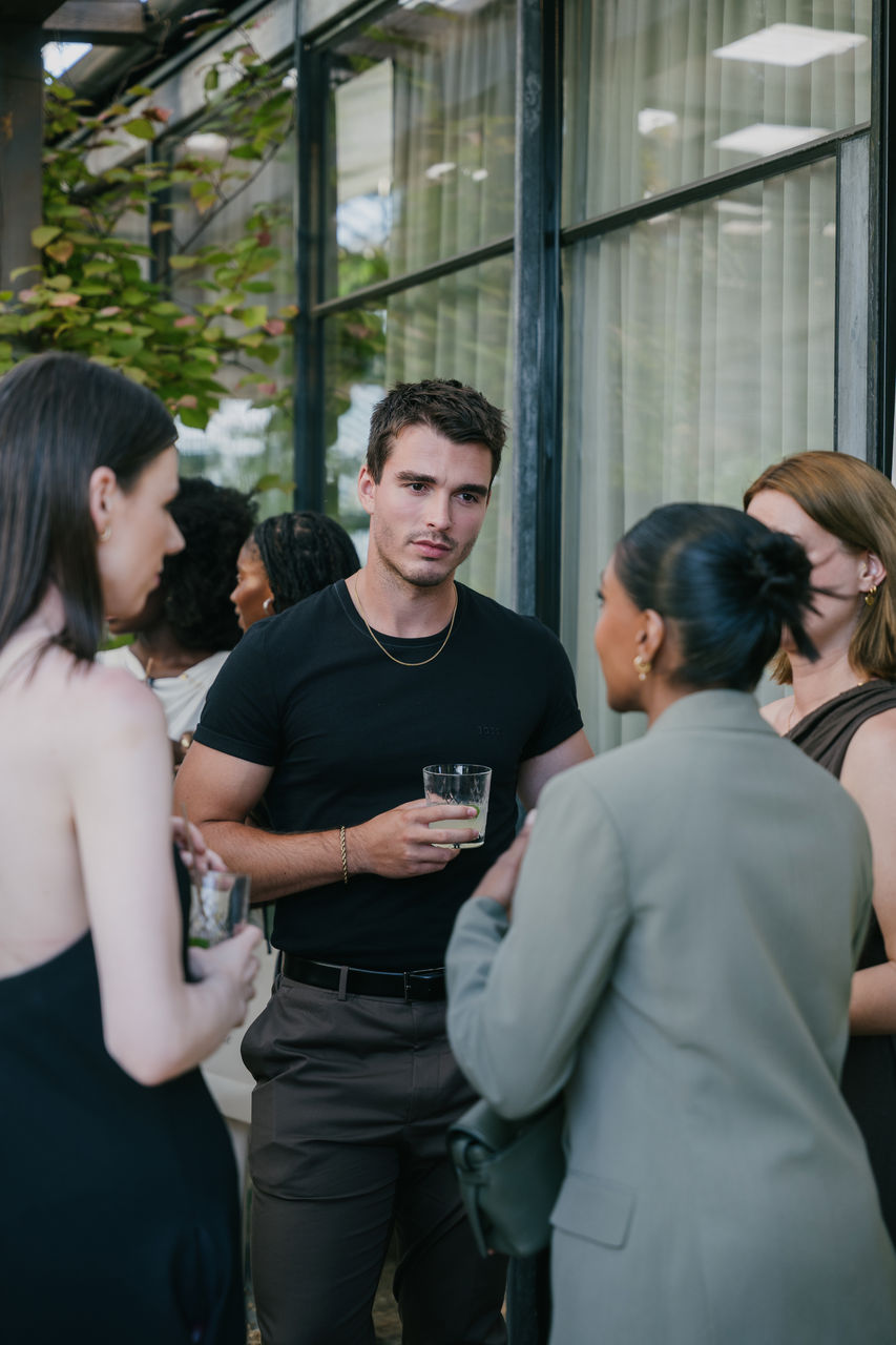 2026_BOSS_Soho_Grand_Slam_Evening_Corey_Mlychreest_with_Charithra_Chandran_and Guests.jpg